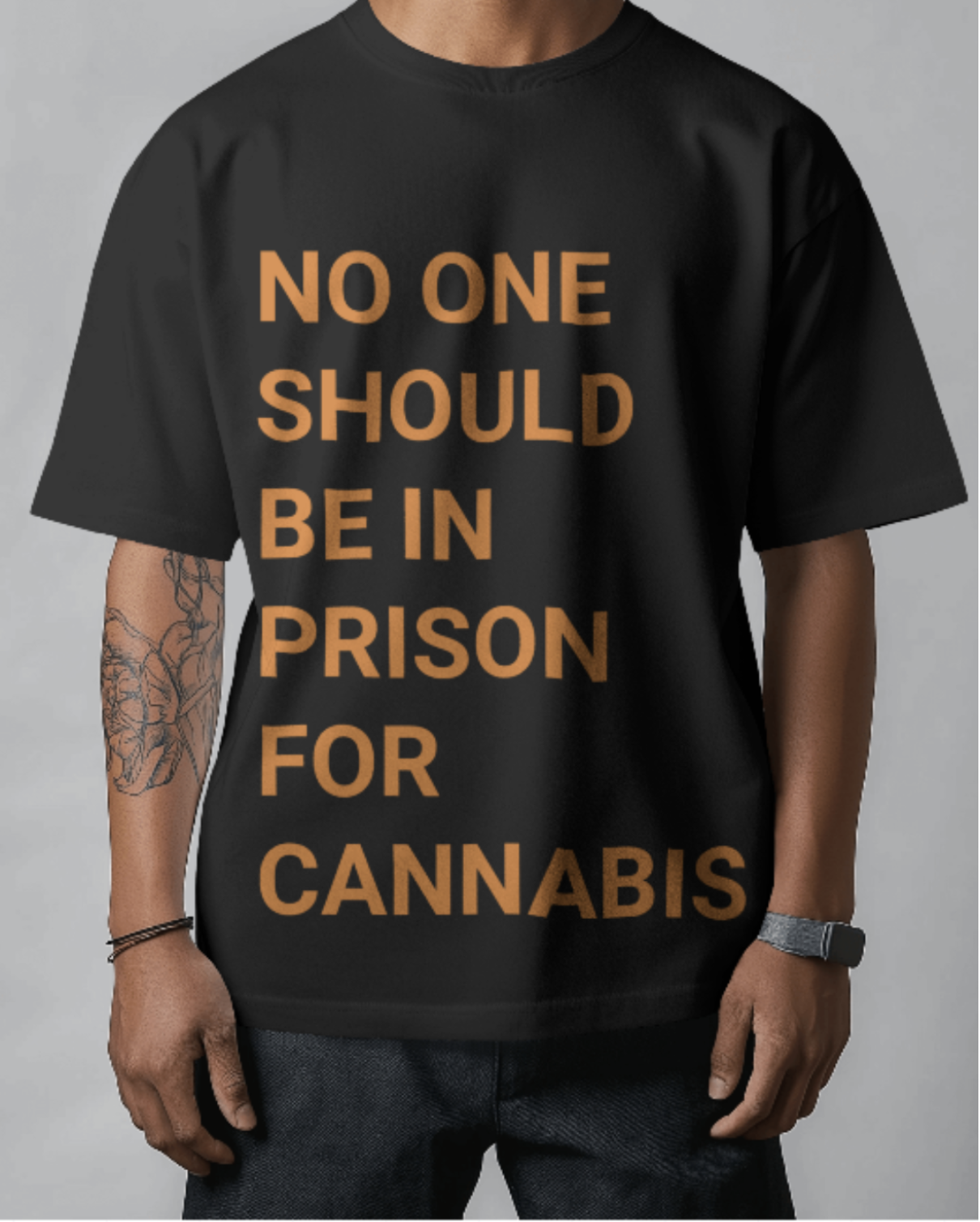40 Tons black premium tee with orange No One Should Be In Prison For Cannabis graphic